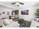 Bright living room open to a modern kitchen, perfect for entertaining and relaxing at 3251 N Adams St, Denver, CO 80205