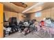Cluttered storage room with exposed ceiling, window, and various items at 3251 N Adams St, Denver, CO 80205