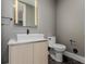 Stylish bathroom with a modern vanity, rectangular sink, and a sleek toilet at 1901 Wazee St # 707, Denver, CO 80202