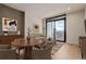 Open-concept living and dining area with city views and stylish furnishings at 1901 Wazee St # 707, Denver, CO 80202