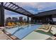 Bright rooftop pool featuring ample lounge seating, a shaded pergola, and beautiful city views at 1901 Wazee St # 707, Denver, CO 80202