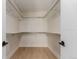 Well-organized walk-in closet with custom shelving and ample storage space at 1901 Wazee St # 707, Denver, CO 80202