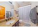 Charming bathroom with granite countertop, and stylish mirror at 3639 Pine Meadow Ave, Parker, CO 80138
