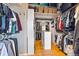 A large walk-in closet with custom shelving, providing ample storage space and organization at 3639 Pine Meadow Ave, Parker, CO 80138