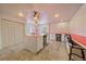 Spacious craft room featuring a large central island and countertop space for various projects at 3639 Pine Meadow Ave, Parker, CO 80138