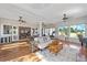 Large living room with lots of natural light and open access to the dining area at 3639 Pine Meadow Ave, Parker, CO 80138