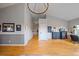 Bright living room features hardwood floors, neutral walls, and modern lighting fixtures at 3639 Pine Meadow Ave, Parker, CO 80138