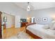 Spacious main bedroom with wood floors, ceiling fan, and ample closet space at 3639 Pine Meadow Ave, Parker, CO 80138