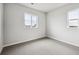 Bright bedroom with two large windows that provide lots of natural light at 2464 Wesley Ln, Lafayette, CO 80026
