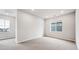 Spacious bedroom featuring two large windows offering ample natural light at 2464 Wesley Ln, Lafayette, CO 80026