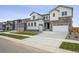 Beautiful home with a two-car garage, modern design, well-kept lawn, and a welcoming entrance at 2464 Wesley Ln, Lafayette, CO 80026