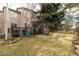 Large backyard with grassy area and deck at 2675 Timberchase Trl, Highlands Ranch, CO 80126