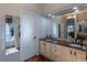 Elegant bathroom with double vanity and marble countertops at 2675 Timberchase Trl, Highlands Ranch, CO 80126