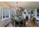 Bright dining room features a chandelier and hardwood floors at 2675 Timberchase Trl, Highlands Ranch, CO 80126