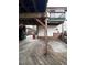 View under a wooden deck with wooden supports and a stone walkway at 2758 S Salida St, Aurora, CO 80013