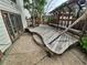 Multi-level wooden deck with built-in benches and access to backyard, perfect for outdoor entertaining at 2758 S Salida St, Aurora, CO 80013