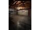 Unfinished basement with drop ceiling and wooden supports and shelving at 2758 S Salida St, Aurora, CO 80013