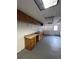 Unfinished basement with gray concrete flooring and built in cabinets at 2758 S Salida St, Aurora, CO 80013