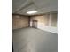 Unfinished basement space with paneled walls and concrete floor at 2758 S Salida St, Aurora, CO 80013