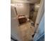 Bathroom featuring tiled floors, glass enclosed shower and single sink vanity at 2758 S Salida St, Aurora, CO 80013