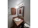 Bathroom vanity with mirror, lighting, and a toilet at 2758 S Salida St, Aurora, CO 80013