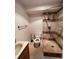 Bathroom with open toilet and stand-up shower with mixed-tile design at 2758 S Salida St, Aurora, CO 80013