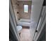 Bathroom showcasing tiled walls, shower and toilet at 2758 S Salida St, Aurora, CO 80013