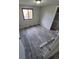 Bedroom with wood-look floors and window with view of backyard at 2758 S Salida St, Aurora, CO 80013
