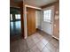 Entryway with tiled floor and access to a pantry and exterior door at 2758 S Salida St, Aurora, CO 80013