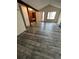 Bright living room with wood-style flooring and neutral wall paint at 2758 S Salida St, Aurora, CO 80013