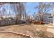 Large backyard with a deck, perfect for gatherings and outdoor activities at 1350 Valentia St, Denver, CO 80220