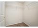 Walk-in closet offers wire shelving for organized storage at 16848 E Gunnison Dr # 9E, Aurora, CO 80017