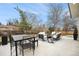 A charming outdoor patio with cozy seating and dining area for outdoor entertaining at 5145 S Clarkson St, Greenwood Village, CO 80121