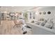 Open basement area with stylish seating, french doors, and convenient kitchenette area at 5145 S Clarkson St, Greenwood Village, CO 80121