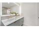 Modern bathroom featuring double sinks with quartz countertop and decorative lighting at 5145 S Clarkson St, Greenwood Village, CO 80121