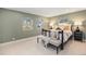 Cozy bedroom with plush carpet, soft lighting, and comfortable furnishings at 5145 S Clarkson St, Greenwood Village, CO 80121