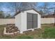 Outdoor storage shed in the backyard, perfect for storing tools and equipment at 5145 S Clarkson St, Greenwood Village, CO 80121