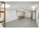 This bright basement offers ample shelving and workspace for a variety of projects at 33589 Robin Ct, Elizabeth, CO 80107