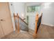 Inviting foyer boasts a staircase, leading to the main floor with natural light from the window above the front door at 33589 Robin Ct, Elizabeth, CO 80107