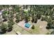 Aerial view of metal outbuilding with green roof next to treed area at 33589 Robin Ct, Elizabeth, CO 80107