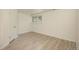 A bright room with wood-look floors and a window, perfect for an office or bedroom at 33589 Robin Ct, Elizabeth, CO 80107