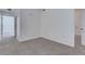 Bedroom with carpet and natural light entering from the open doorway at 3261 S Waco Ct # K, Aurora, CO 80013