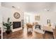 Bright living room featuring fireplace, hardwood floors, and neutral decor at 13020 E Linvale Pl, Aurora, CO 80014