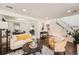Comfortable living room with stylish furnishings and hardwood floors at 13020 E Linvale Pl, Aurora, CO 80014