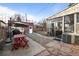 Well-maintained backyard featuring a picnic table, BBQ, and landscaped pathway at 1429 Hudson St, Denver, CO 80220