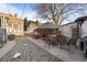 Spacious backyard with ample seating, rock feature, and well-kept landscaping at 1429 Hudson St, Denver, CO 80220