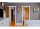 Bedroom featuring hardwood floors and stylish decor at 1429 Hudson St, Denver, CO 80220