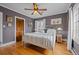 Bedroom with hardwood floors, a ceiling fan and warm gray paint at 1429 Hudson St, Denver, CO 80220