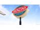 Eye-catching outdoor sign of the Italian Restaurant, Benzina, on a bright, sunny day at 1429 Hudson St, Denver, CO 80220