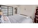 Bedroom featuring a cozy bed, closet, and doorway, offering ample space and privacy at 20710 E Princeton Pl, Aurora, CO 80013